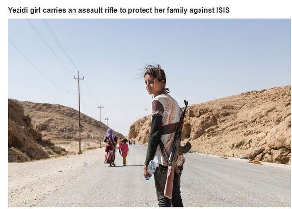 Uma menina Yazidi com uma arma para proteger sua família
